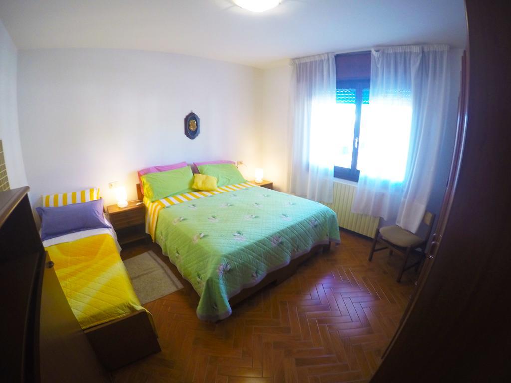 Caorle Economy Apartments Habitación foto